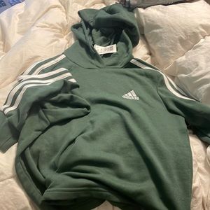 Green Adidas sweater you a tag